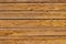 Yellow weathered wooden fence surface texture