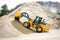 Yellow Wheel Loader at Aggregate Rock Quarry