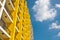 Yellow and white building and blue sky