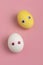 Yellow and white Easter eggs with decorative eyes.
