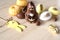 Yellow and white Easter Eggs on wooden background.