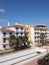 Yellow and white housing estate on Sal island in Cape Verde - vertical