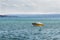Yellow and White Motorboat on Skaneateles Lake