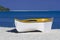 Yellow and white rowing boat