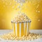 a yellow and white striped popcorn bucket with popcorn spilling out of it on a yellow background with a drop of popcorn