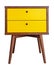 Yellow wood bedside table. Modern designer nightstand isolated on white background front view. cabinet with two drawers