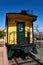 Yellow wood railroad caboose