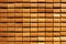 Yellow wooden beaded mat closeup texture background