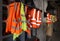 Yellow work vests are hanging on a hanger