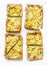 Yellow zucchini puff pastry mini tarts on a light background, top view. Tasty snack, tapas