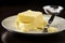 Yellowish Plate piece butter. Generate AI