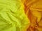 Yelloworange paper background silk surface empty blank sheets vivid colors