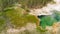 Yellowstone Geyser as seen from above. Pool in the middle of the forest, Wyoming