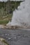 Yellowstone national park riverside geyser