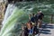 YELLOWSTONE NATIONAL PARK, WYOMING, USA - JULY 17, 2017: Tourists watching and taking pictures of Lower Yellowstone Falls. Grand C