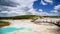 YELLOWSTONE, WY - JULY 2019: Tourists visit Norris Geyser Basin on a sunny day