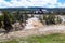 Yellowstone, Wyoming, USA, May 25, 2021, Tourists at the Firehole river and the Old Faithful Inn at the Upper Gyser Basin