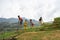 Yen Bai, Vietnam - Sep 17, 2016: Ethnic minority kids playing on fence by terraced field in Van Chan district