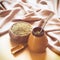 Yerba mate in calabash and wooden bowl on linen table