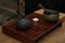 Yerba Mate drink in a traditional vessel with calabash and a burning candle and a Tibetan singing bowl of Wellness on a tea ceremo