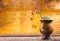 Yerba mate tea in wooden bowl on wooden table. Traditional drink from Brazil, Argentina, Paraguay and South America