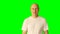 Yes no do not know happy smile - gestures at green screen. Adult caucasian man close up view upper half portrait. Clip