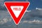 Yield Sign with clouds