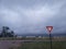 Yield sign on a cloudy day