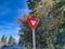 Yield sign next to a road after a lane merge