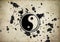 Yin yang symbol splatter on grunge background