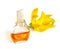 Ylang-Ylang essential oil with flowers.