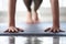 Yoga athlete woman holds plank on mat