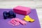yoga brick and jump rope on purple gym mat