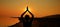 Yoga day, silhouette woman doing yoga in the sunset Sky on celebrating international yoga day