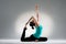 Yoga female student sitting on the floor