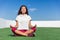 Yoga fitness woman doing summer meditation outdoor