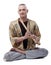Yoga guru playing flute, isolated on white