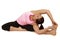 Yoga instructor in seated side stretch pose Parsva