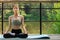 Yoga lotus park,teenager in nature does exercises, trains,healthy lifestyle,sport and fitness concept