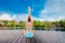 Yoga meditation near pool. Bikini body woman