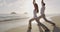 Yoga, meditation and wellness lifestyle concept on sunset beach
