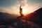 Yoga on mountain top at sunset, woman silhouette on sky background, generative AI