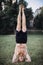 Yoga at park. Bearded man doing yoga in the green park. Concept of a healthy lifestyle