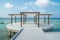 Yoga pavilion outdoors near ocean during sunny day in luxury resort