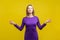 Yoga practice, harmony. Portrait of peaceful woman meditating. studio shot isolated on yellow background