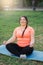 yoga practicing harmony balance obese woman park