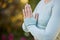 Yoga, prayer and zen woman in with hands in spiritual meditation, peaceful or worship gesture outdoors in nature