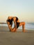 Yoga retreat. Variation of Low Lunge Pose, Anjaneyasana. Lunging back bending asana. Flexible spine and back. Healthy lifestyle.