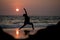 Yoga silhouette at ocean cost and sunset India