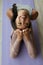 Yoga. Smiling girl stretching body at home closeup